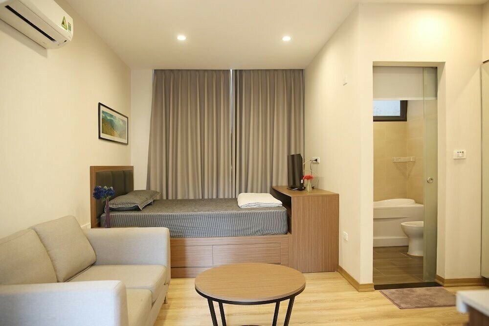 Фото Lotus Inn Serviced Apartment