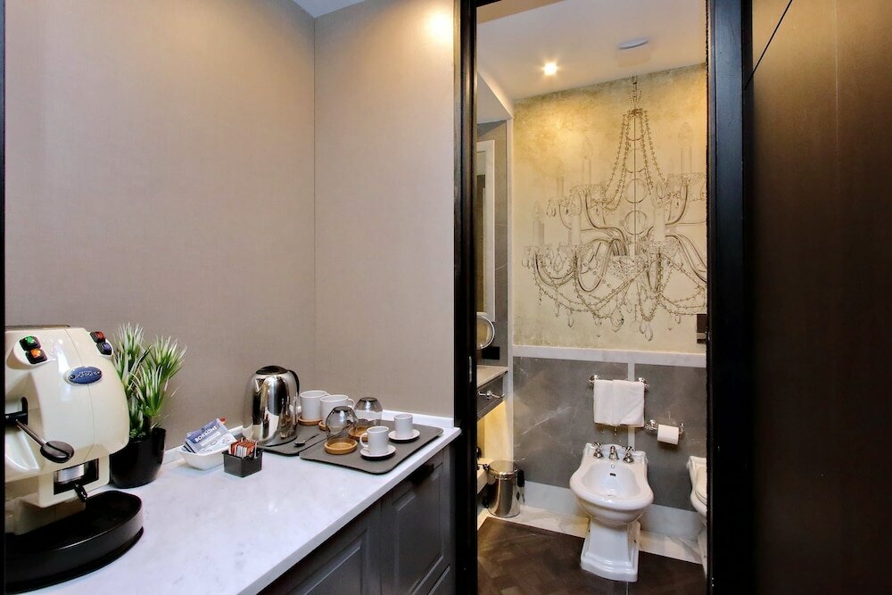 Фото Helmirage Piazza Di Spagna Suite