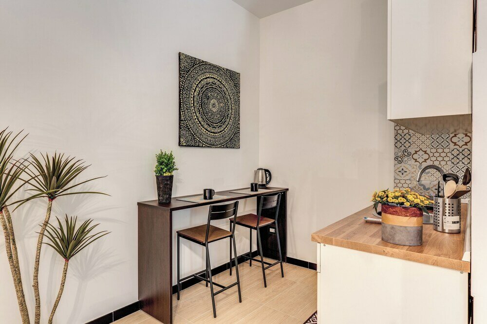 Фото The Quarters Naples Apartment