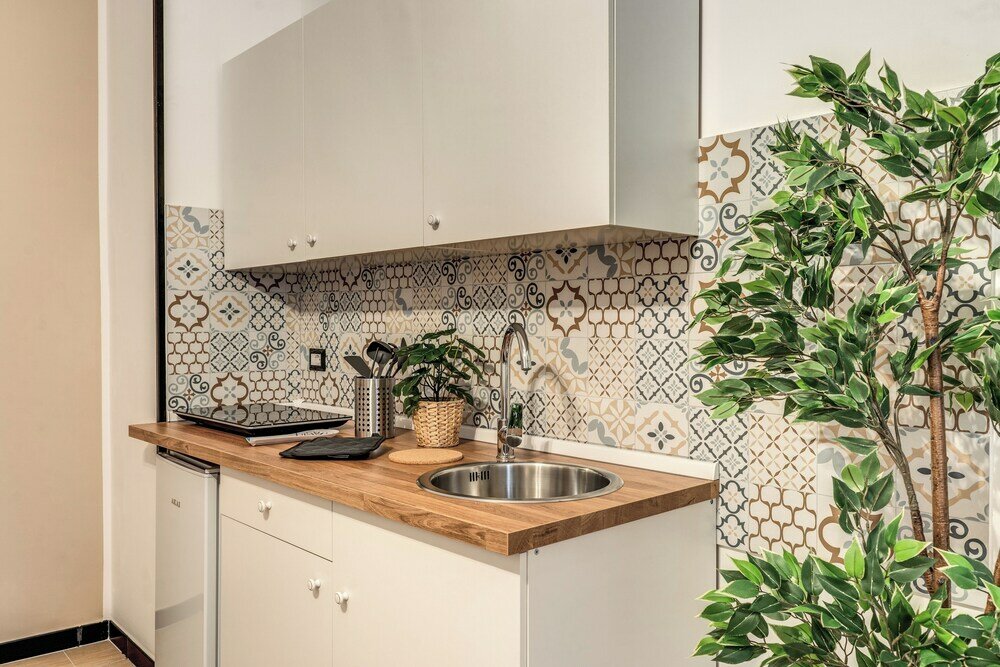 Фото The Quarters Naples Apartment