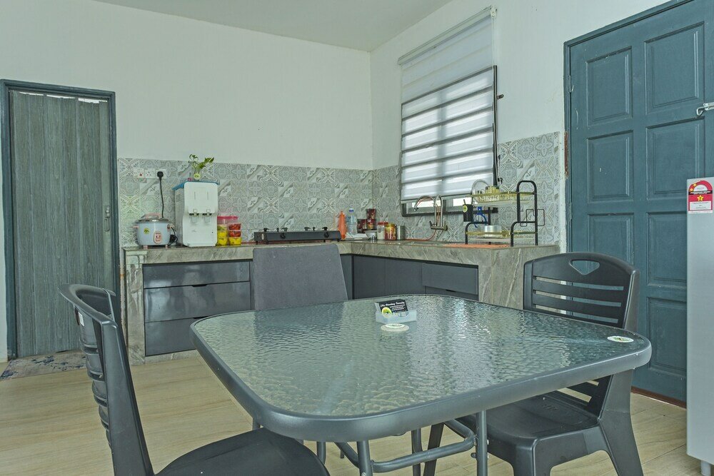 Фото Oyo Home 90682 Liliz Mambang Farmstay