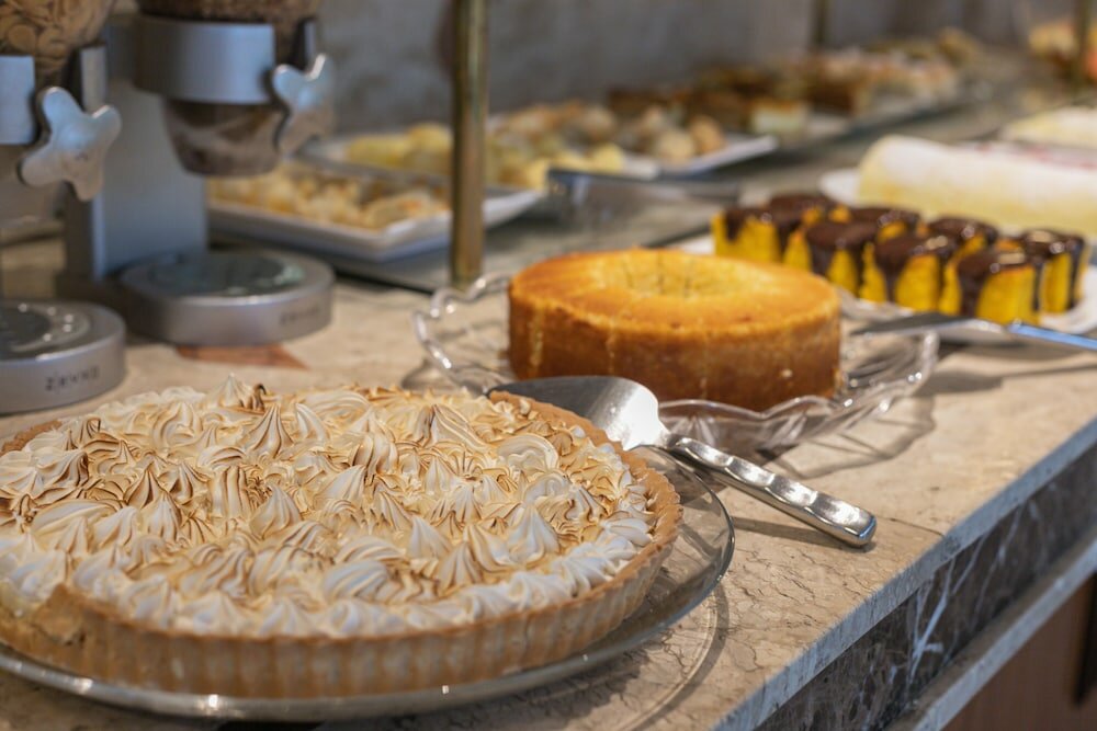 Фото Le Suisse Elegance Hotel