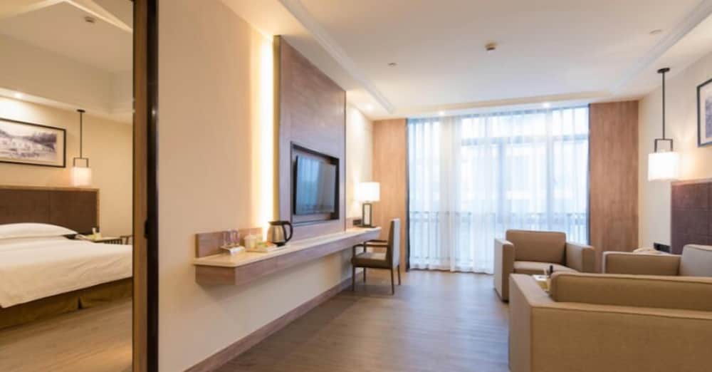 Фото Auden International Hotel