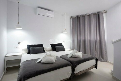 Апартаменты Playaflor Chill Out Resort, a 50 mtrs de la playa в Плайя-де-лас-Америкас