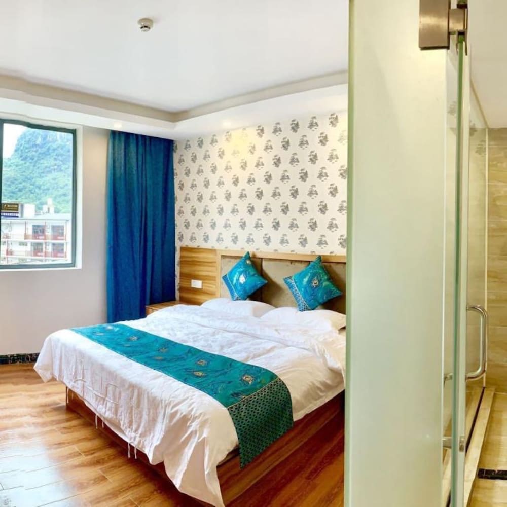 Фото Yangshuo Qingyunge Hotel