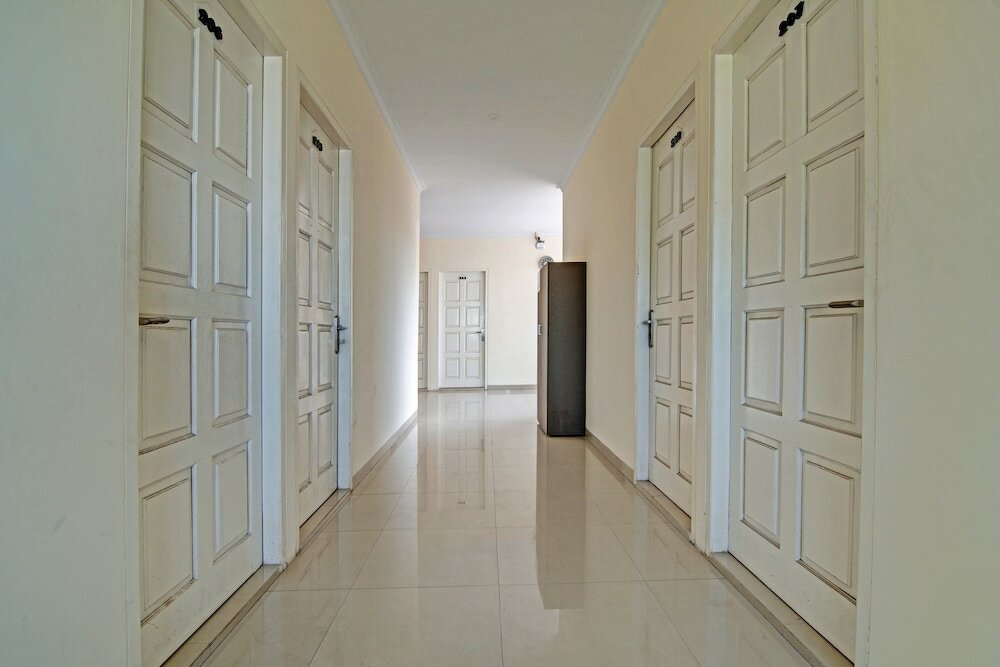 Фото Oyo 91269 R&s Living Residence