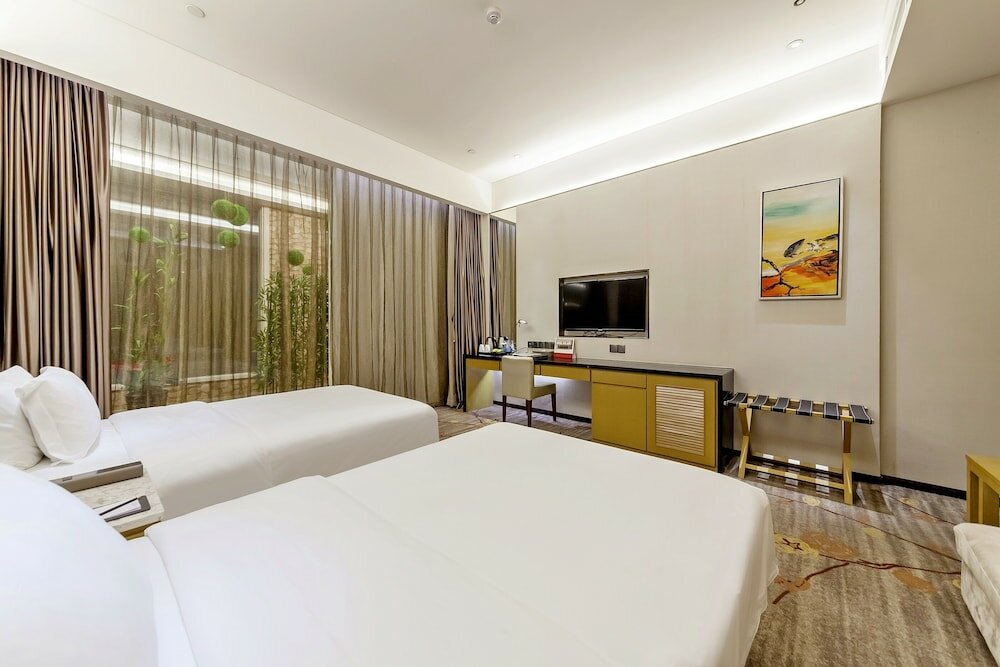 Фото Tianyuan Junlong Hotel