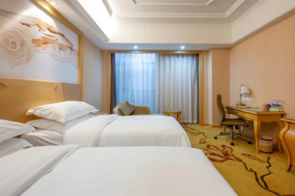 Фото Vienna International Hotel - Ningbo City West Xintiandi