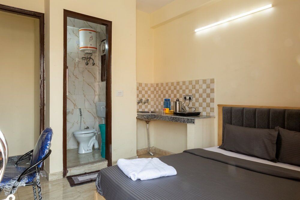 Фото Eat Sleep Wander Studio Apartments