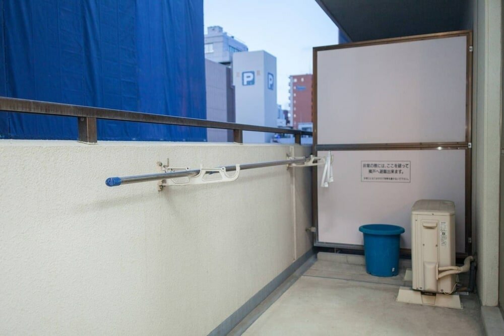 Фото Shinsaibashi Midtown Apartments