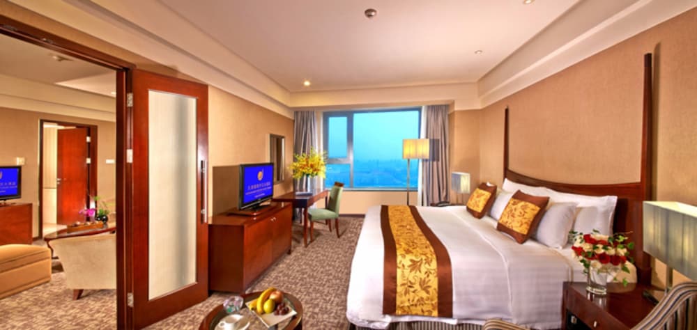 Фото Grand New Century Hotel Binhai Tianjin