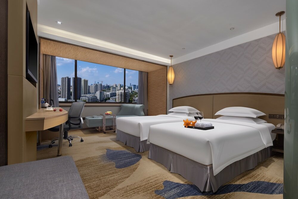 Фото Kaiserdom Hotel Guangzhou Ouzhuang