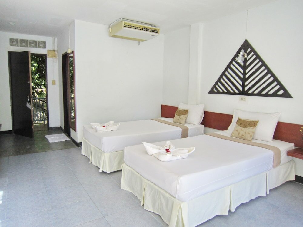 Фото Thaniza Beachfront Resort