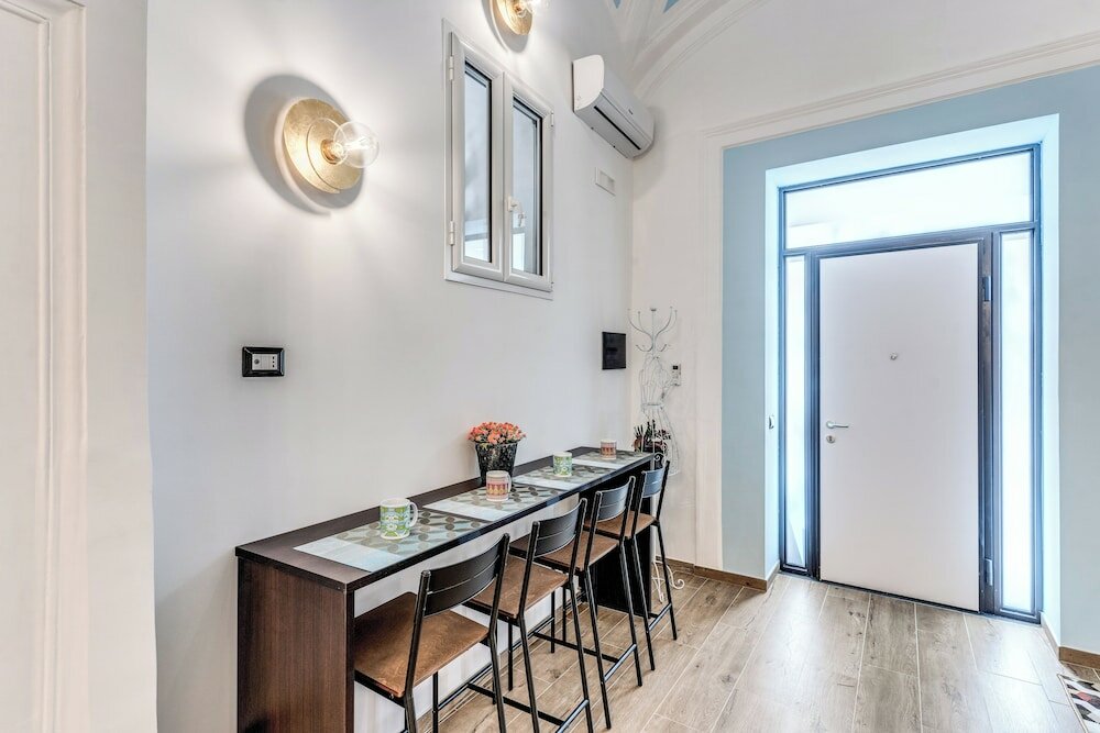 Фото The Quarters Naples Apartment