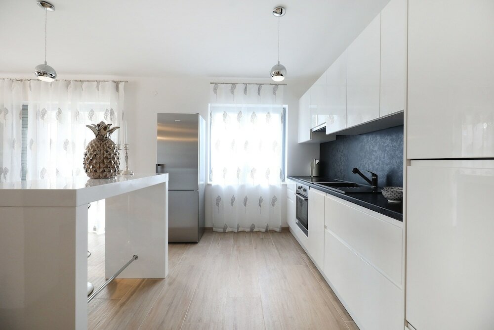 Фото Villa Olive Garden Apartments