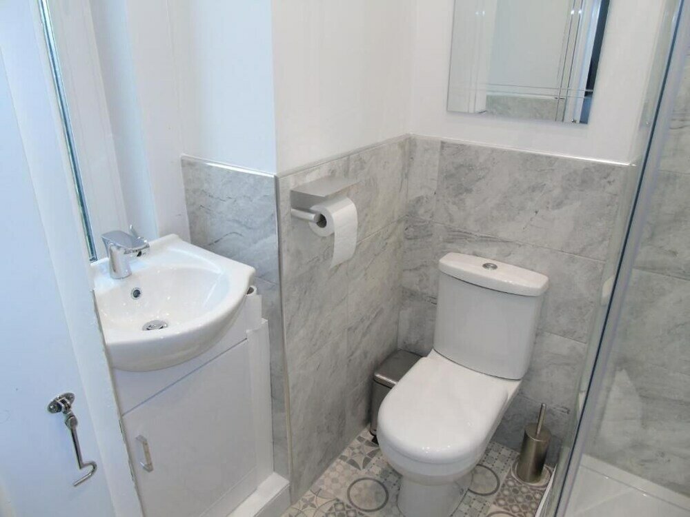 Фото Snug - Sealladh Mara Apartment