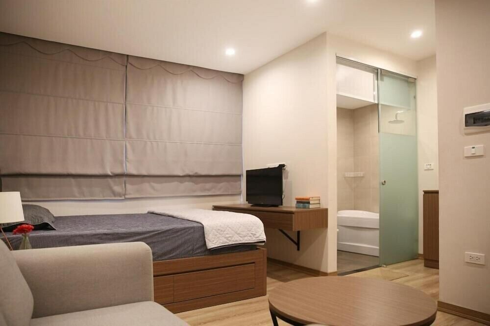Фото Lotus Inn Serviced Apartment