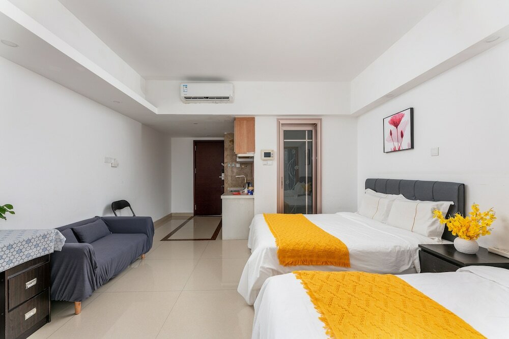 Фото Guangzhou Damei Apartment