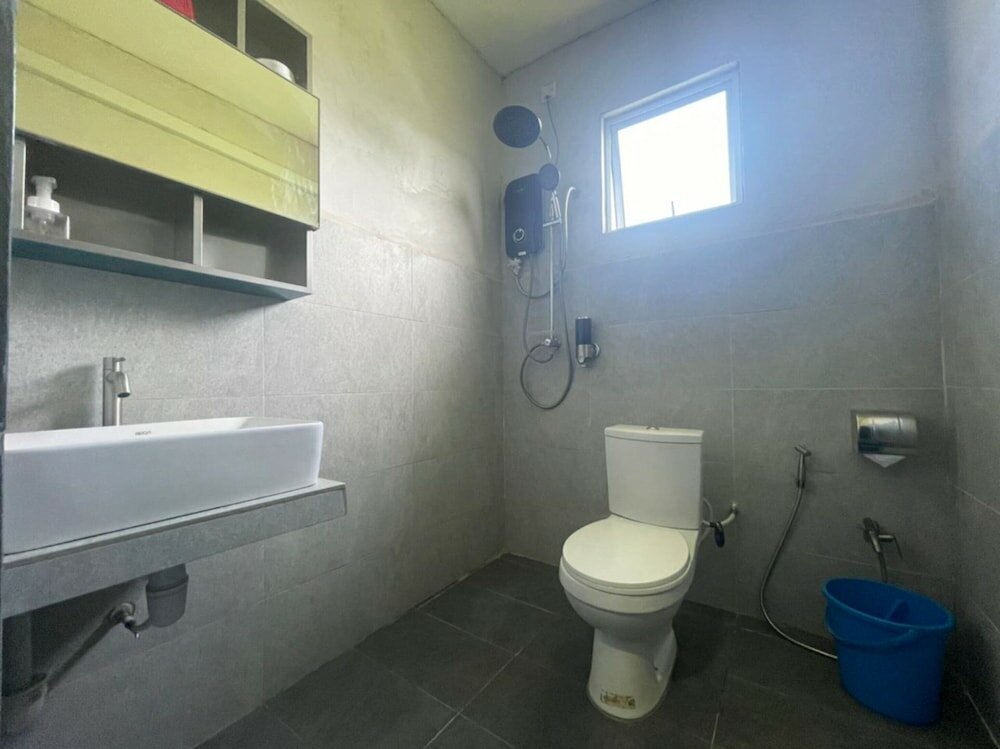 Фото Oyo Home 90370 D'tampi Homestay