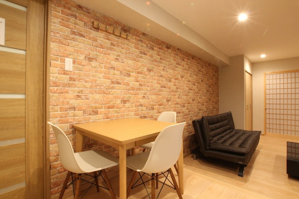 Фото Shimanouchi Luxury Apartment