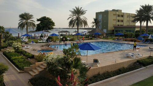 Гостиница Flamingo Beach Resort в Умм-эль-Кайвайне