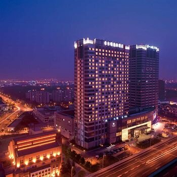 Внешний вид отеля DoubleTree by Hilton Wuxi в Уси, фото 1