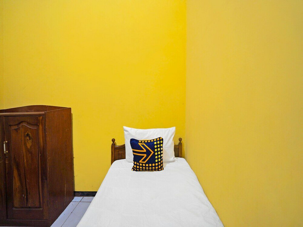 Фото Spot On 91869 Insan Mulia Kost Syariah