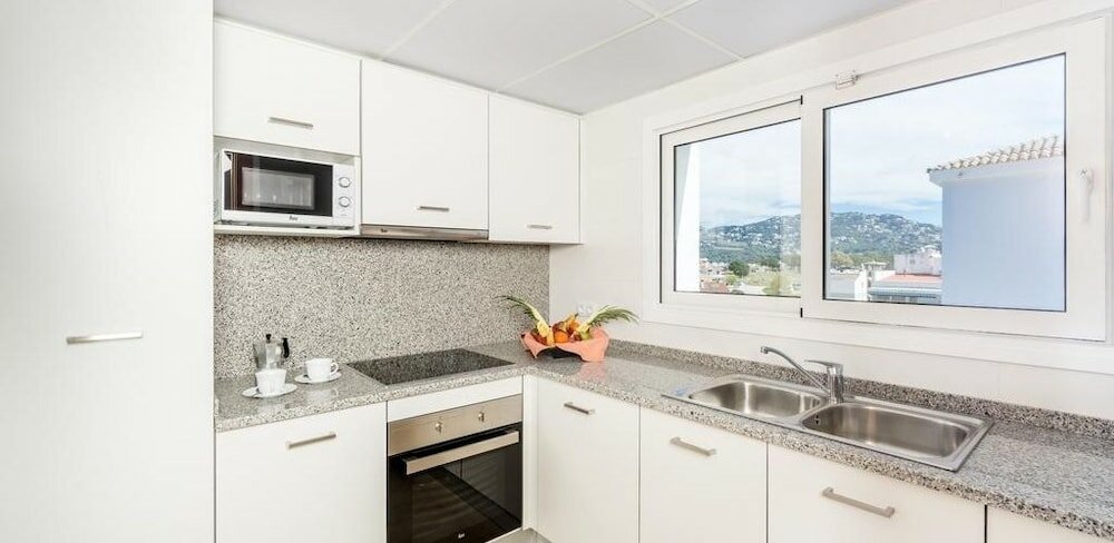 Фото Apartamento cerca de Water World y Gnomo Park