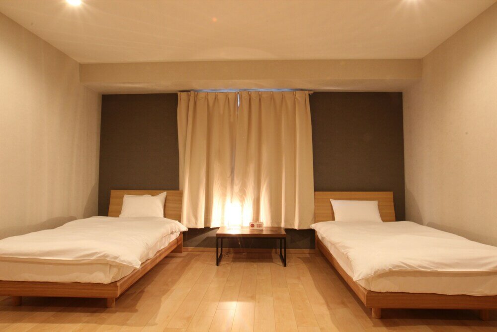 Фото Shimanouchi Luxury Apartment