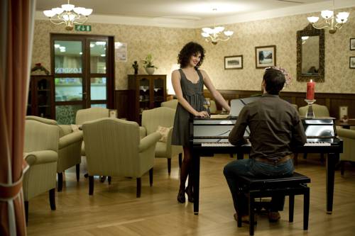 Фото Ramada Hotel & Suites by Wyndham Kranjska Gora