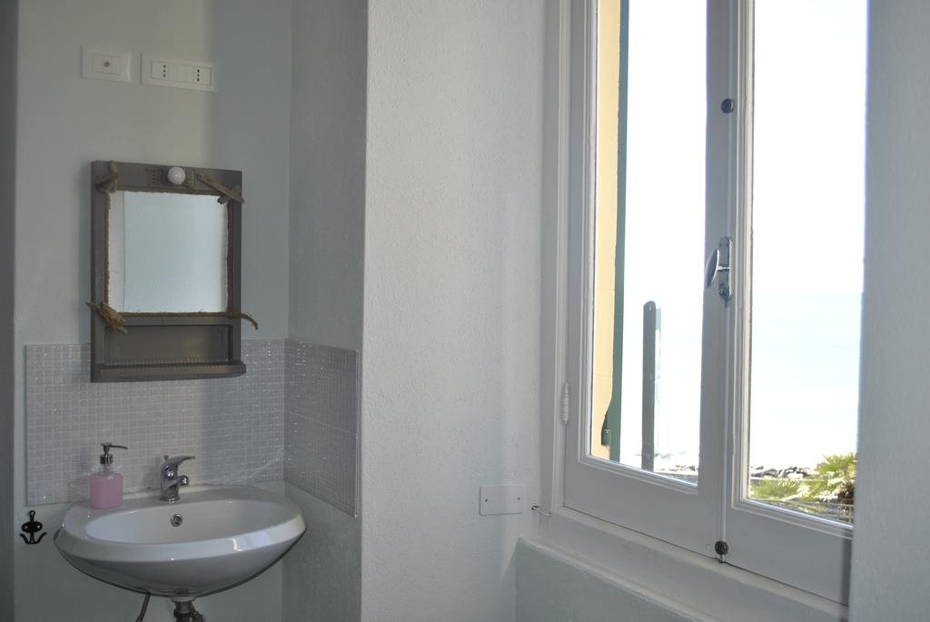 Фото Al Piccolo Scoglio - Room & Breakfast