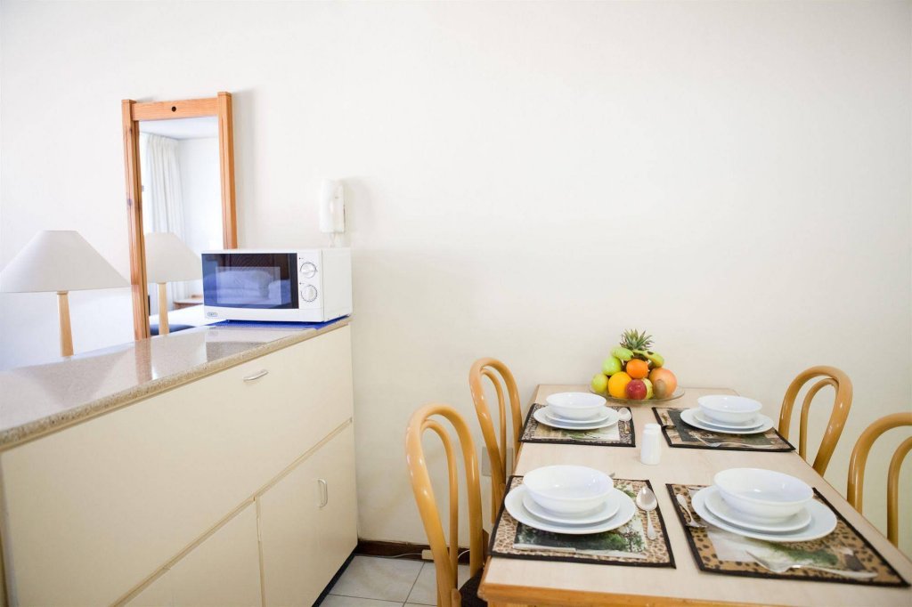 Фото Gardens Centre Holiday Apartments