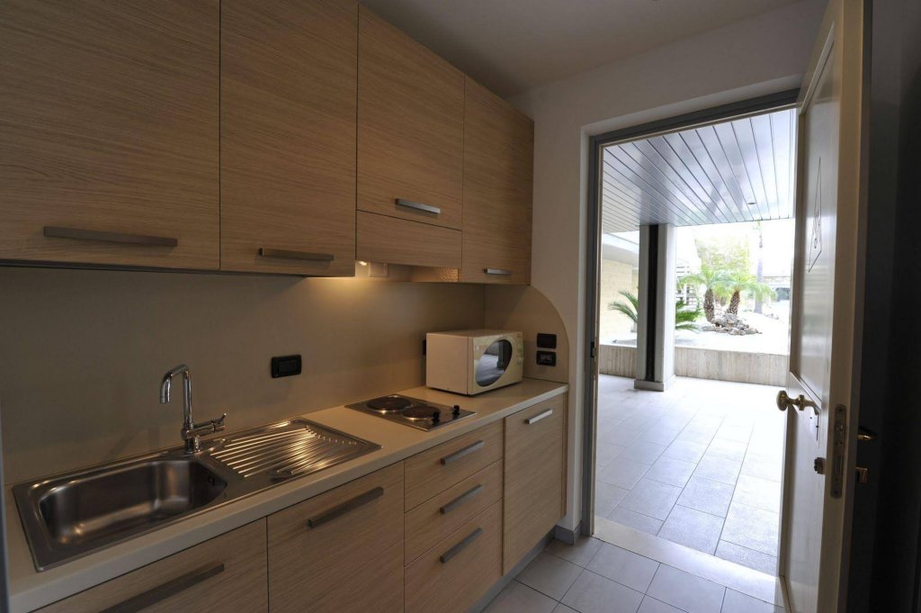 Фото Aregai Marina Hotel & Residence