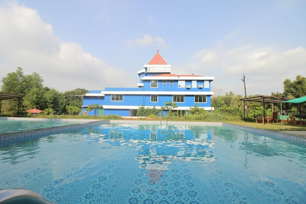 Фото Oyo 39345 Chrisander's Resort