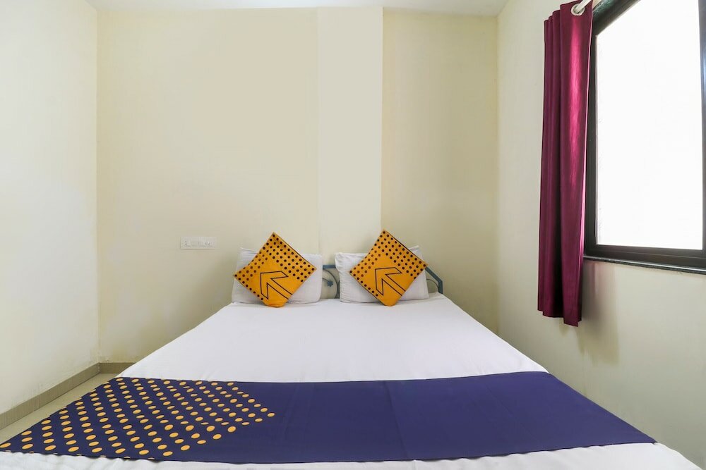 Фото Spot On 37095 Sai Sidhi Lodge