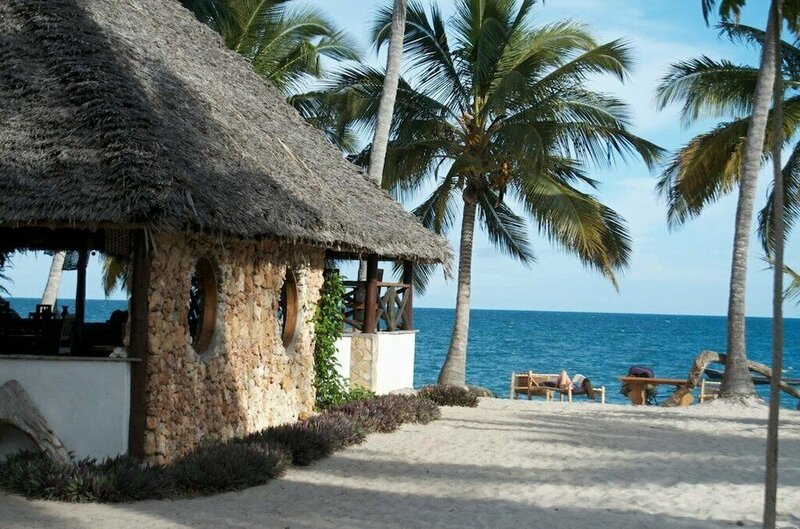 Гостиница Mike's Beach Cottages