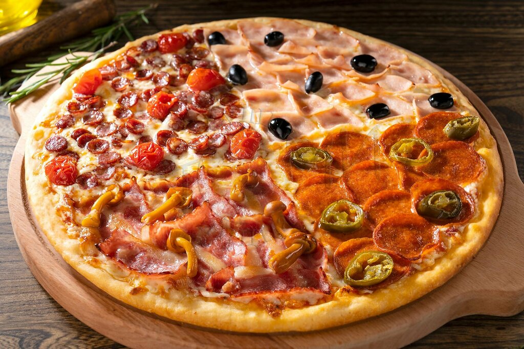 Pizza assortment on rustic table