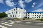 Обнял (Lokomotivnaya Street, 2), garment factory