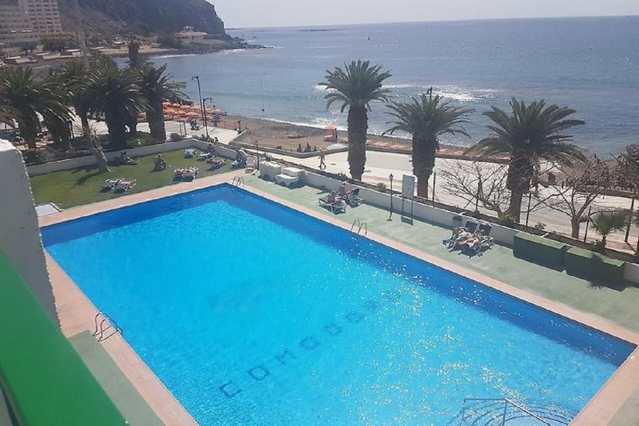 Фото Comodoro Apartments