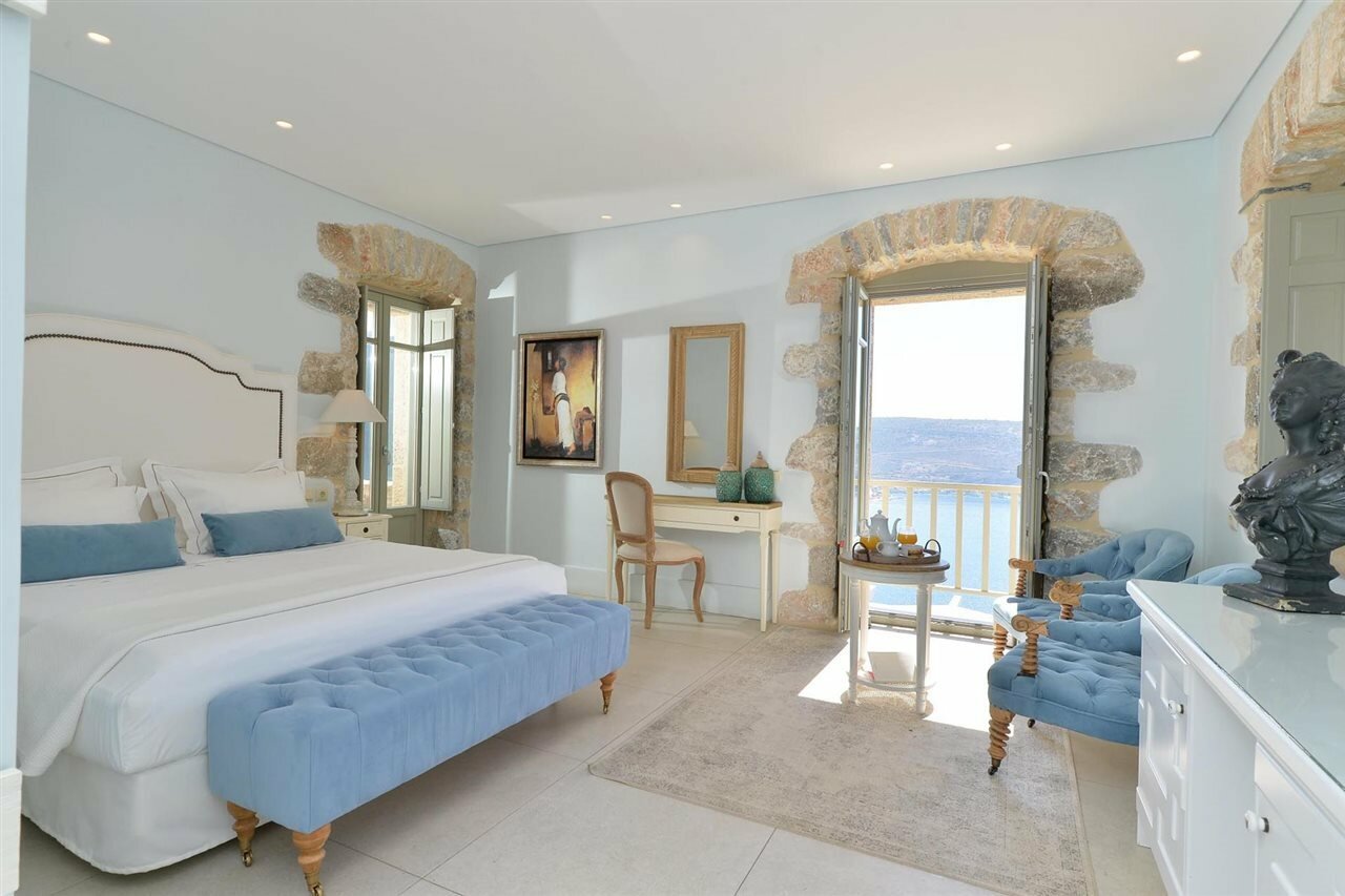 Фото Akrolithi Boutique Hotel