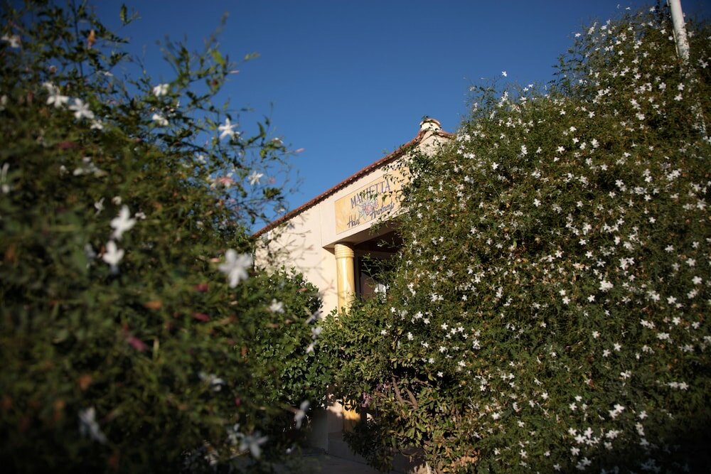 Фото Marietta Hotel & Apartments