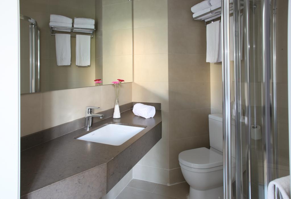 Фото Mh Apartments Suites