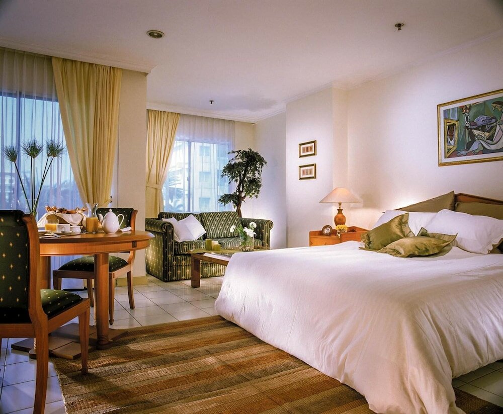 Фото Griya Prapanca Apartment