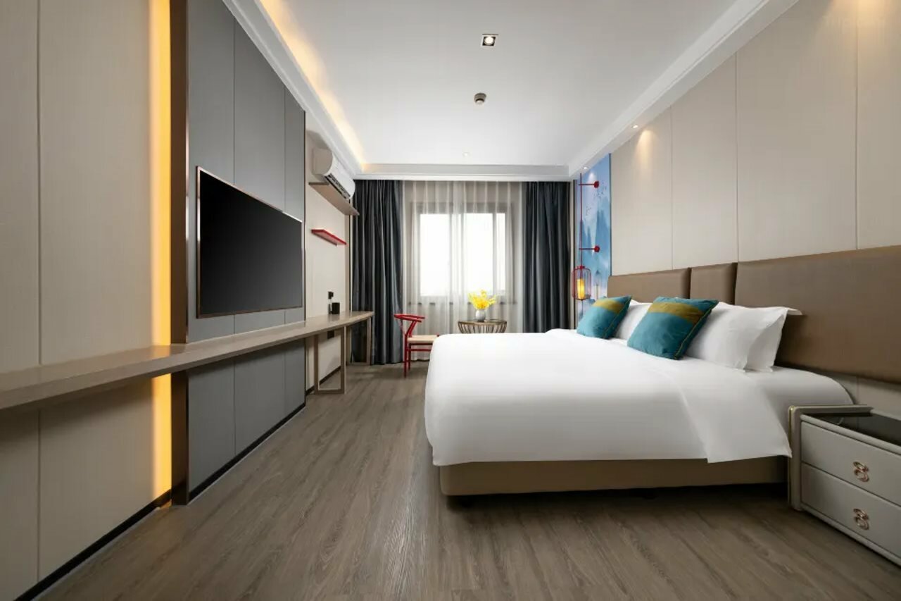 Фото Kaiyuan Manju Xiaoshan International Airport West Gate Store