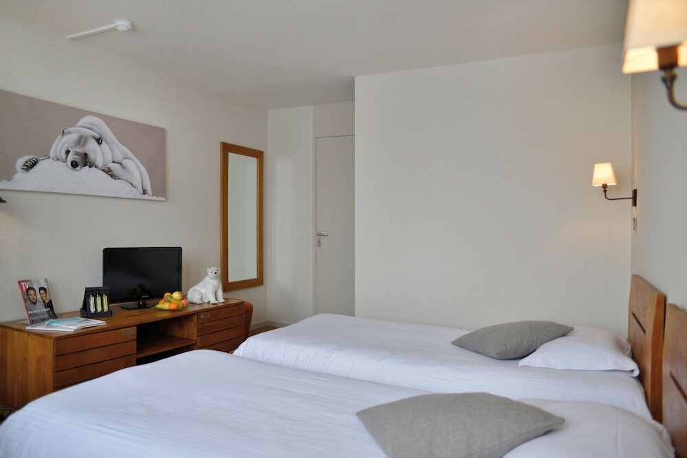 Фото Hôtel l'Eden des Cimes - Vacances Bleues - Belle Plagne 2100