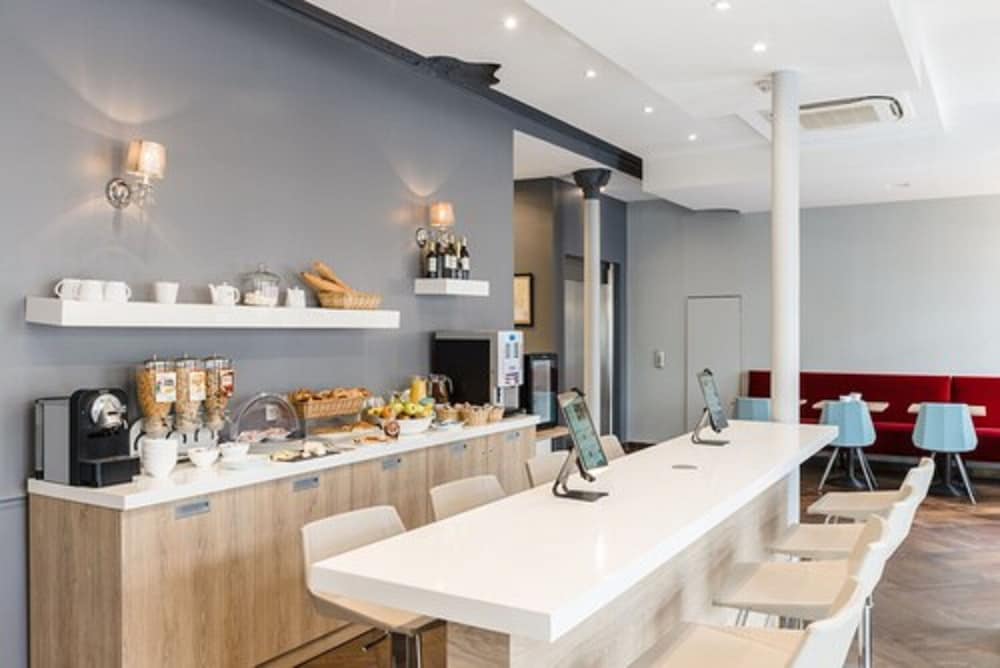 Фото Grand Hotel Clichy Paris