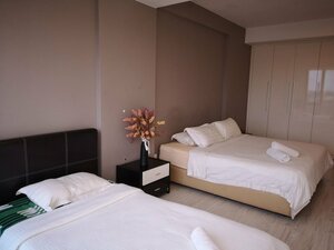 Гостиница Marina Travellers Suite Sky Karamunsing