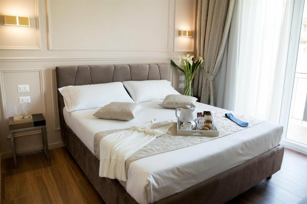 Фото Unicum Roma Suites