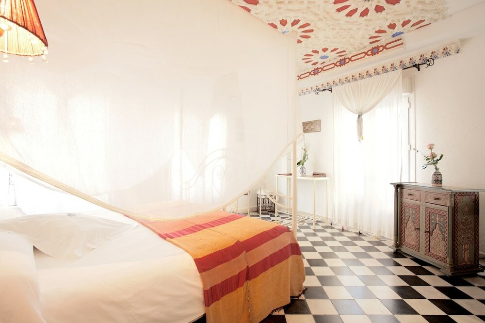 Фото Alcoba del Rey de Sevilla Boutique Hotel