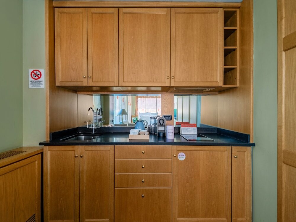 Фото Camperio House Suites